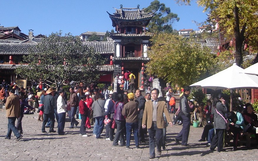 Tourists in Market Square of Lijiang Old City
